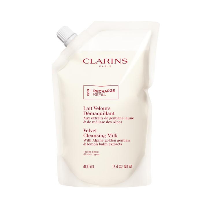 Clarins Velvet Cleansing Milk refill pouch in a soft white material, featuring a screw cap, labeled with product details and eco-friendly symbols, holding 400 ml of cleansing milk.
