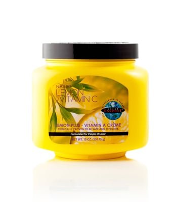 Bright yellow jar of Clear Essence Lemon Plus Vitamin A Crème, 19 oz, featuring a black lid and a label with green leaves and lemon graphics, designed for skin care.