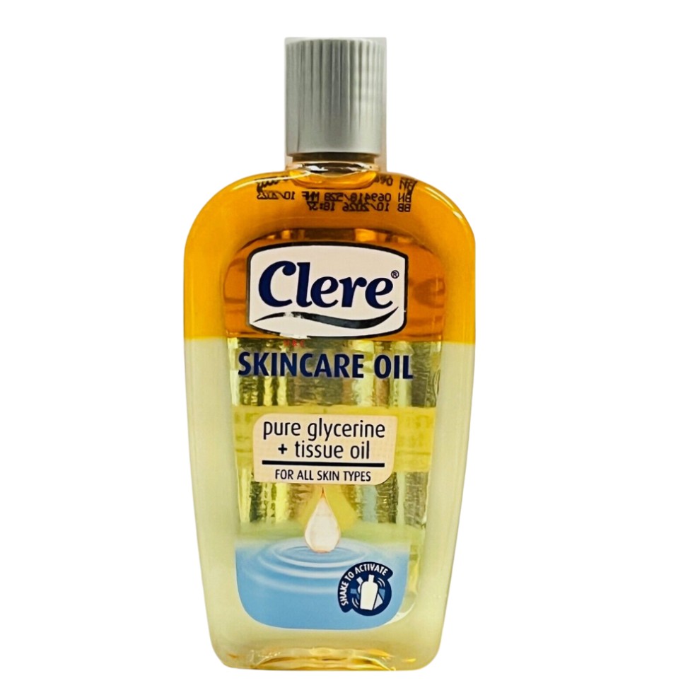Clear Skin Care Oil by Clere in a transparent bottle, featuring a yellow liquid, a flip-top cap, and a label highlighting "pure glycerine + tissue oil" for all skin types.