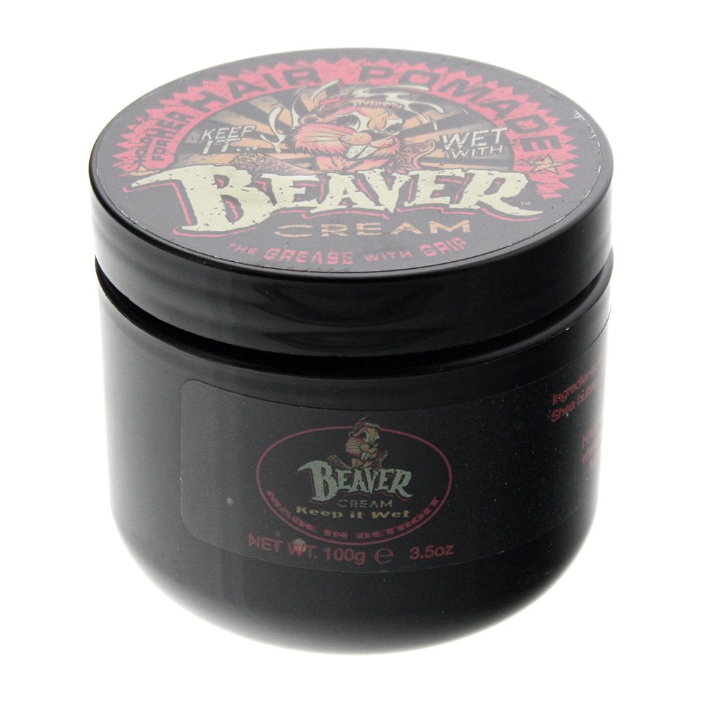 Black jar of Cock Grease Beaver Oil Base Pomade, featuring a colorful graphic of a beaver and bold text, labeled "Keep it Wet" and "The Grease with Grip," containing 100g.