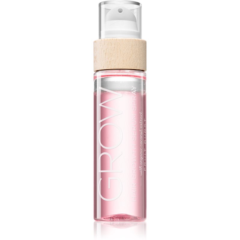 Clear glass spray bottle with a wooden cap, containing a light pink serum labeled "GROW HAIR GROWTH SERUM SPRAY" in bold white text, 110 ml size.