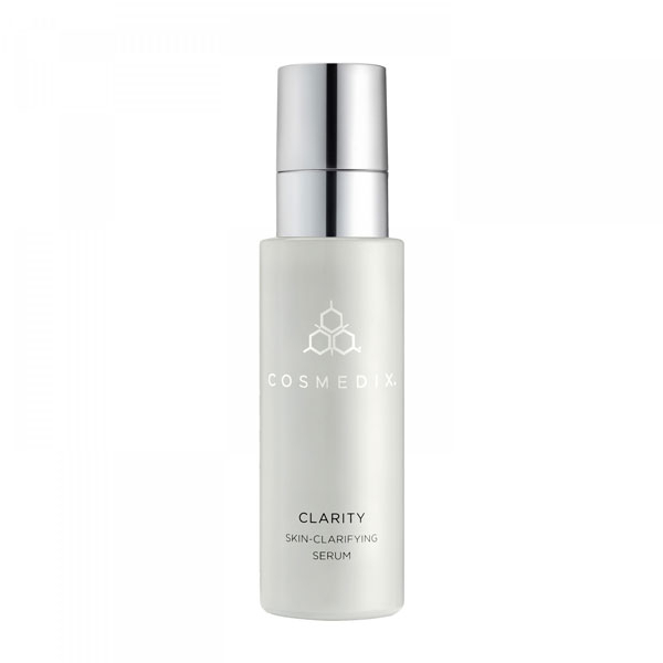 Clear glass bottle with a silver pump top, labeled "COSMEDIX CLARITY SKIN-CLARIFYING SERUM," designed for women, containing 30ml/1oz of product.