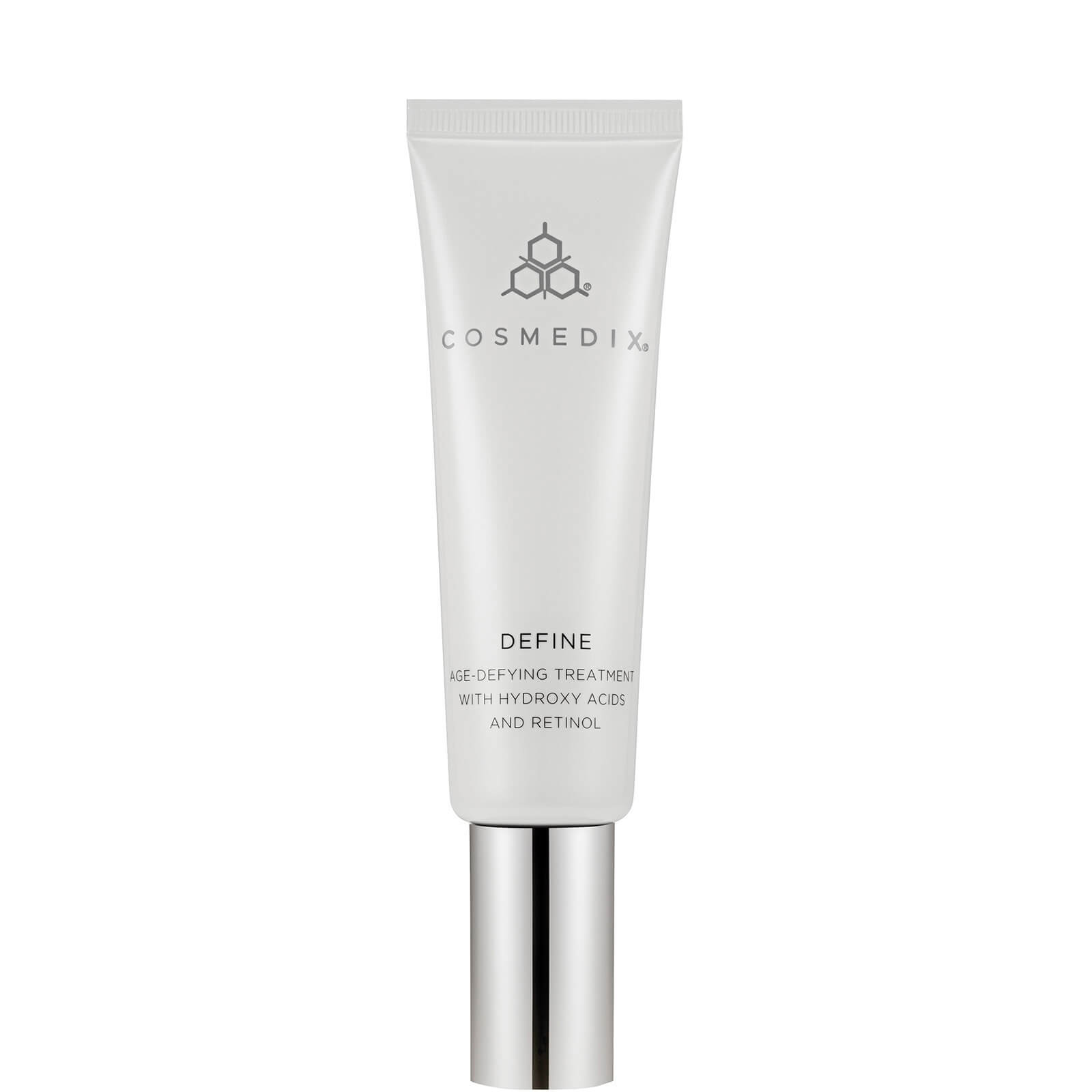 White tube with silver accents, featuring the CosMedix logo and product name "DEFINE" prominently displayed, designed for age-defying treatment with hydroxy acids and retinol.