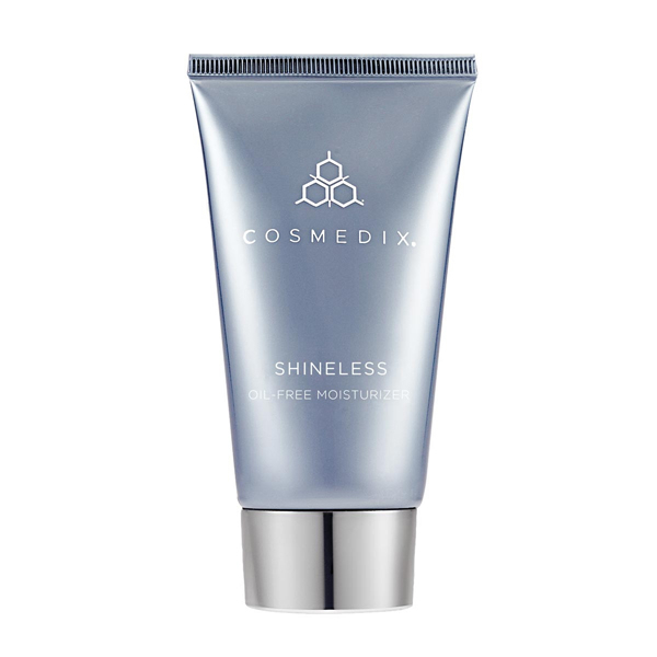 Silver-blue tube of COSMEDIX Shineless Moisturiser with a white logo, featuring a sleek design and a silver cap, labeled as oil-free and containing 79g of product.