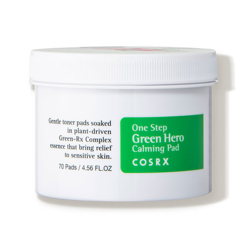 White cylindrical container with a green label, labeled "One Step Green Hero Calming Pad," containing 70 toner pads designed for soothing sensitive skin.