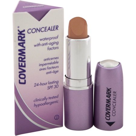 Covermark Waterproof Concealer in shade 2, featuring a sleek silver and lavender tube, with a twist-up applicator and a cardboard box highlighting its waterproof and anti-aging properties.