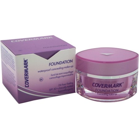 Purple jar of Covermark Foundation Waterproof Concealing Make-up SPF 30, 0.51 oz, with a matching box, featuring a sleek design and labeled for women.
