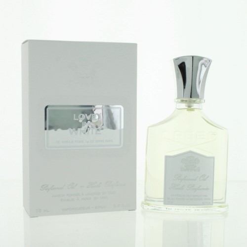 Clear glass bottle with a silver cap, featuring the label "CREED" and "Love in White," alongside a white box with a silver logo, both elegantly designed.