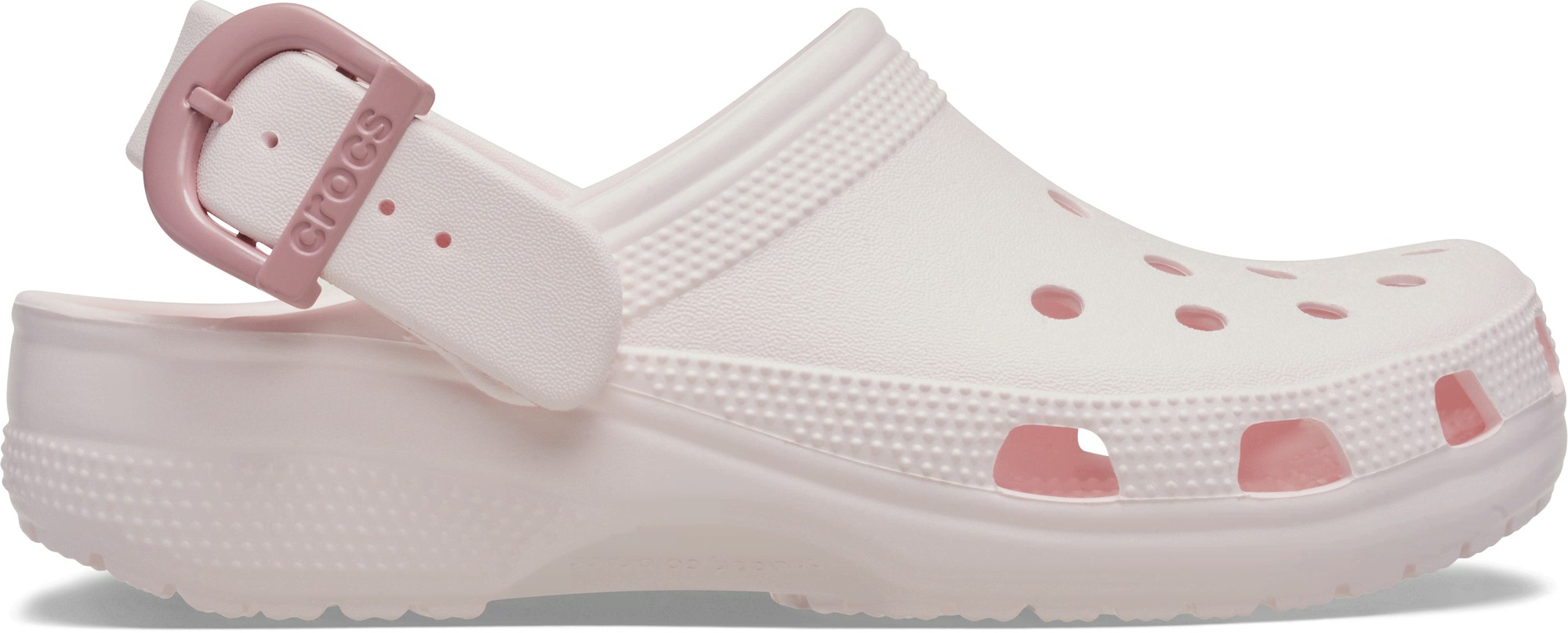 Light pink Crocs Classic Buckle Clog featuring a sturdy design, ventilation holes, and a matching adjustable buckle strap for a secure fit.