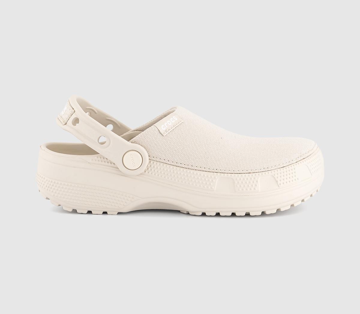 White Crocs women's crafted clog featuring a textured upper, adjustable back strap, and a chunky sole for comfort and support.