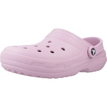 Purple Crocs Classic Lined Clog featuring a soft, fuzzy interior, ventilation holes, and a signature logo button on the side, designed for comfort and casual wear.