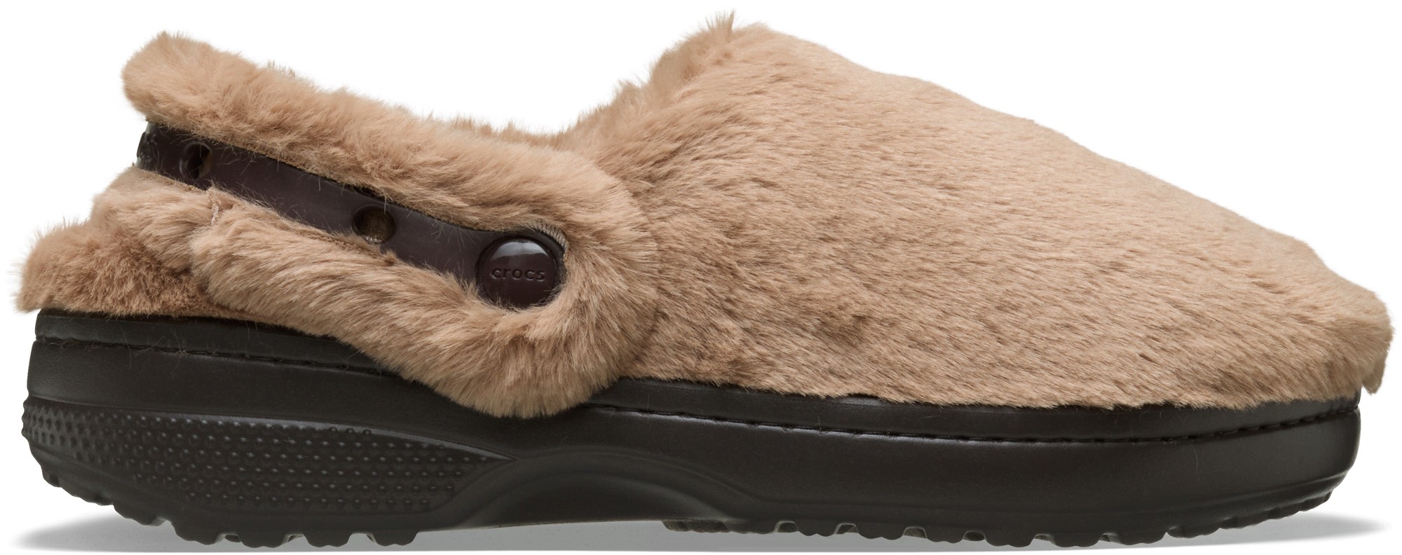Tan faux fur clog with a soft, plush exterior, featuring a dark brown strap and button detail, designed for comfort and warmth.