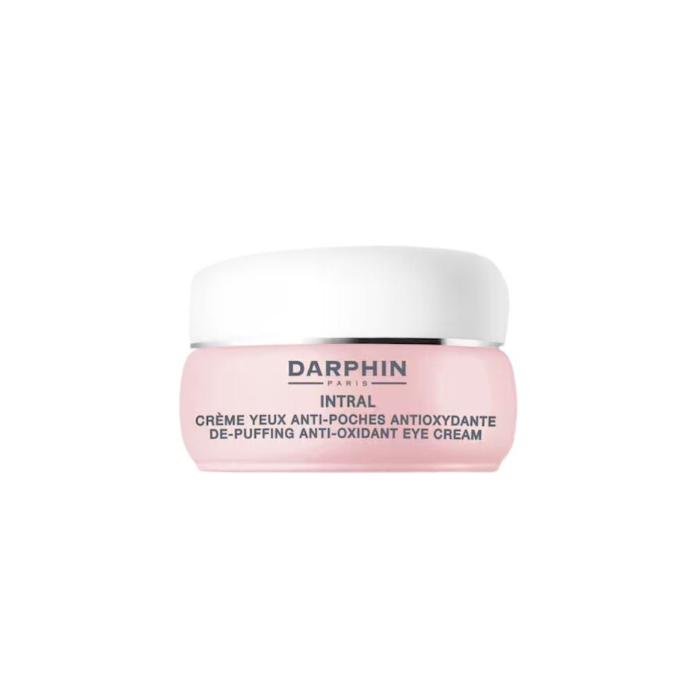 Small pink jar of Darphin's Intral Inner Youth Rescue Eye Cream, featuring a white lid and labeled with product details in black text.