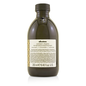 Brown glass bottle with a black cap, containing 280 ml of Davines product, featuring a textured label with product details in multiple languages.