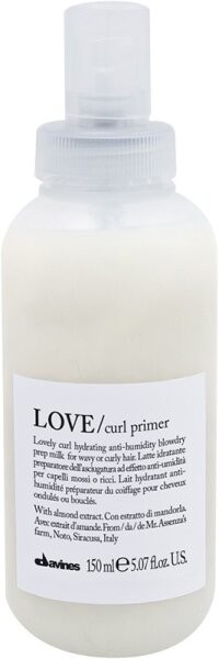 Clear plastic bottle with a spray top, containing a creamy white curl primer labeled "LOVE Curl Primer" by Davines, 150 ml, featuring a minimalist design and text in black on a white background.