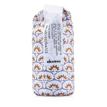 Clear plastic bottle with a floral-patterned label in blue and orange, featuring the product name "Davines More Inside This Is a Medium Hold Modeling Gel" and a white cap.