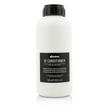 White plastic bottle of Davines OI Conditioner, 1000ml, featuring a black cap and a black label with white text, designed for all hair types.
