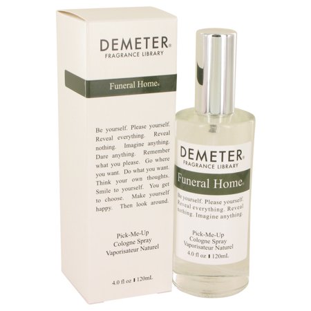 Clear glass cologne spray bottle with a silver cap, labeled "Funeral Home" in green and white, alongside a matching box featuring similar design elements.