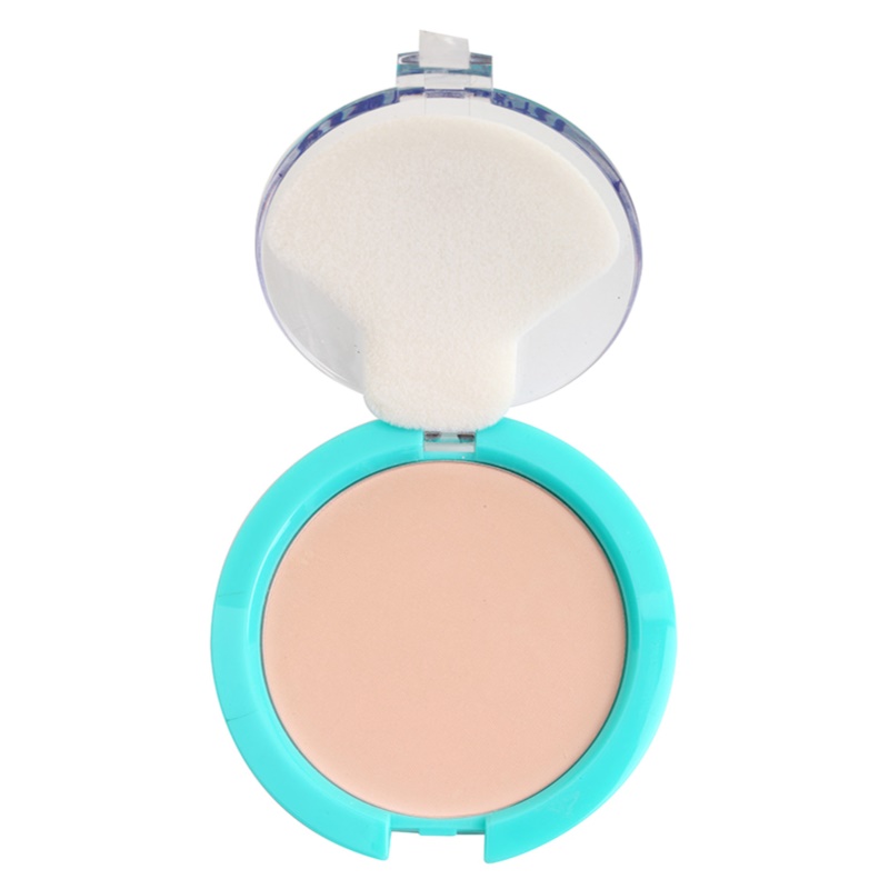 Mattifying powder in a round compact with a turquoise outer casing, featuring a soft applicator and a light sand shade for problem skin.