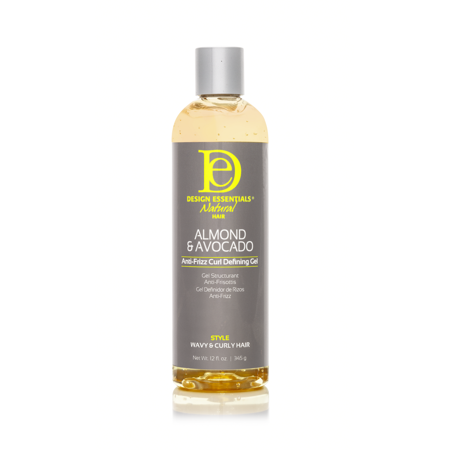 Clear plastic bottle of Design Essentials Natural Almond & Avocado Anti-frizz Curl Defining Gel, featuring a gray label with yellow accents, 12 fl oz, promoting wavy and curly hair styling.