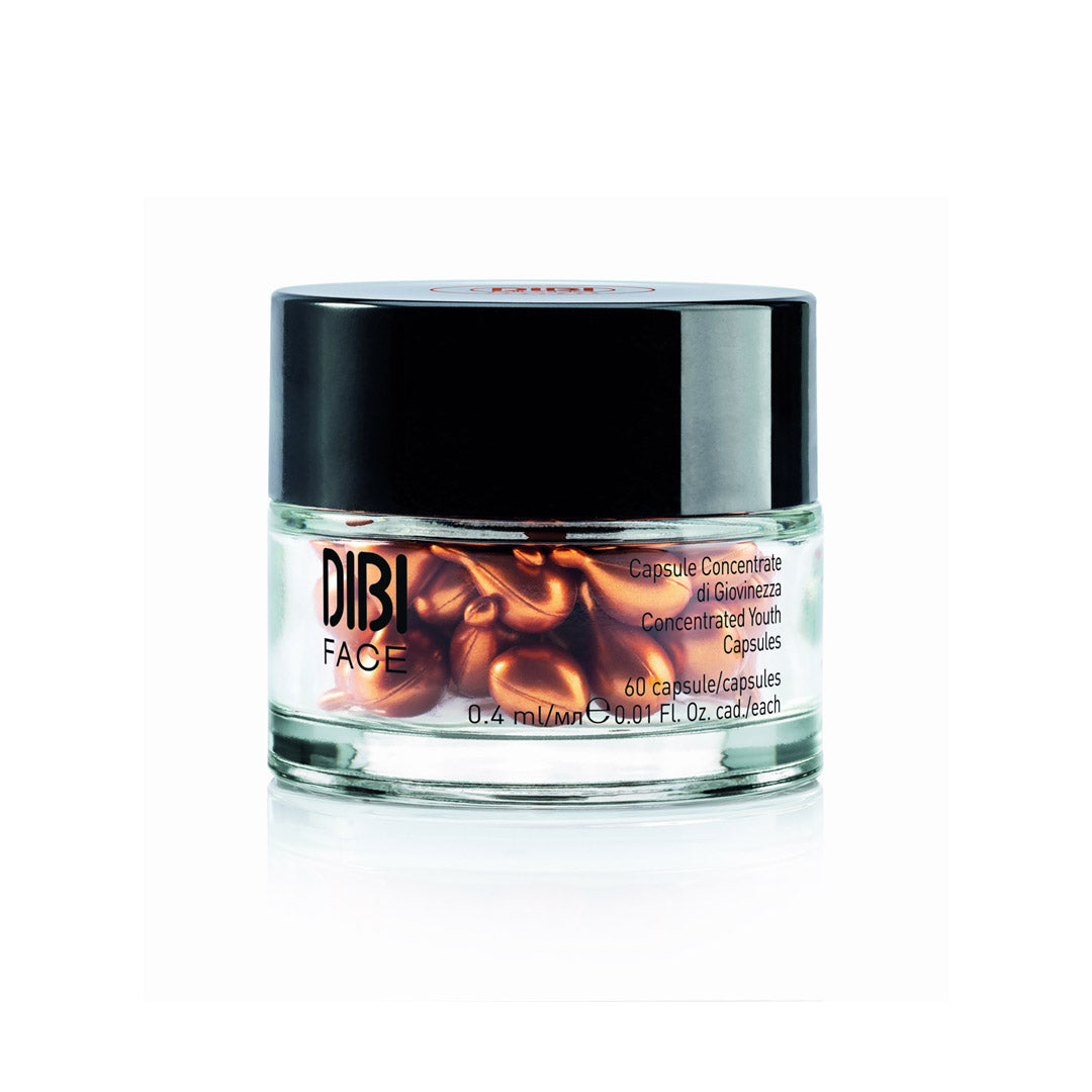 Clear glass jar containing 60 golden-brown anti-ageing capsules, with a black lid and label featuring "DIBI FACE" branding, promoting youthful skin revitalization.