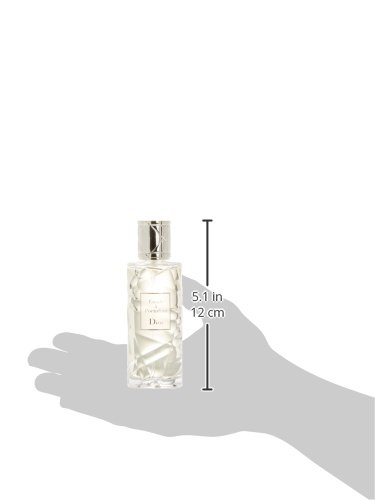 Clear glass bottle of DIOR Escale a Portofino Eau De Toilette with a silver cap, featuring a textured design and a label with the brand name.