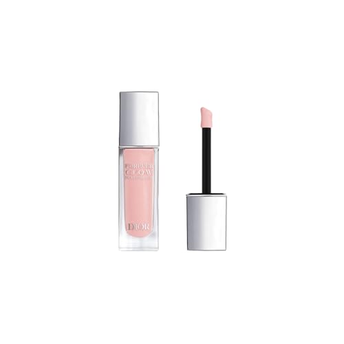 Dior Forever Glow Maximizer liquid highlighter in a clear glass tube with a silver cap, featuring a soft pink hue and a doe-foot applicator for precise application.