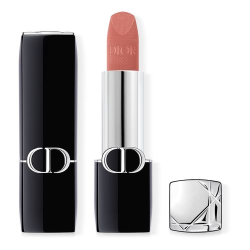DIOR Rouge Dior Couture Colour Lipstick in a sleek black case with a silver band, featuring a satin finish in a soft pink shade, capped with a geometric silver top.
