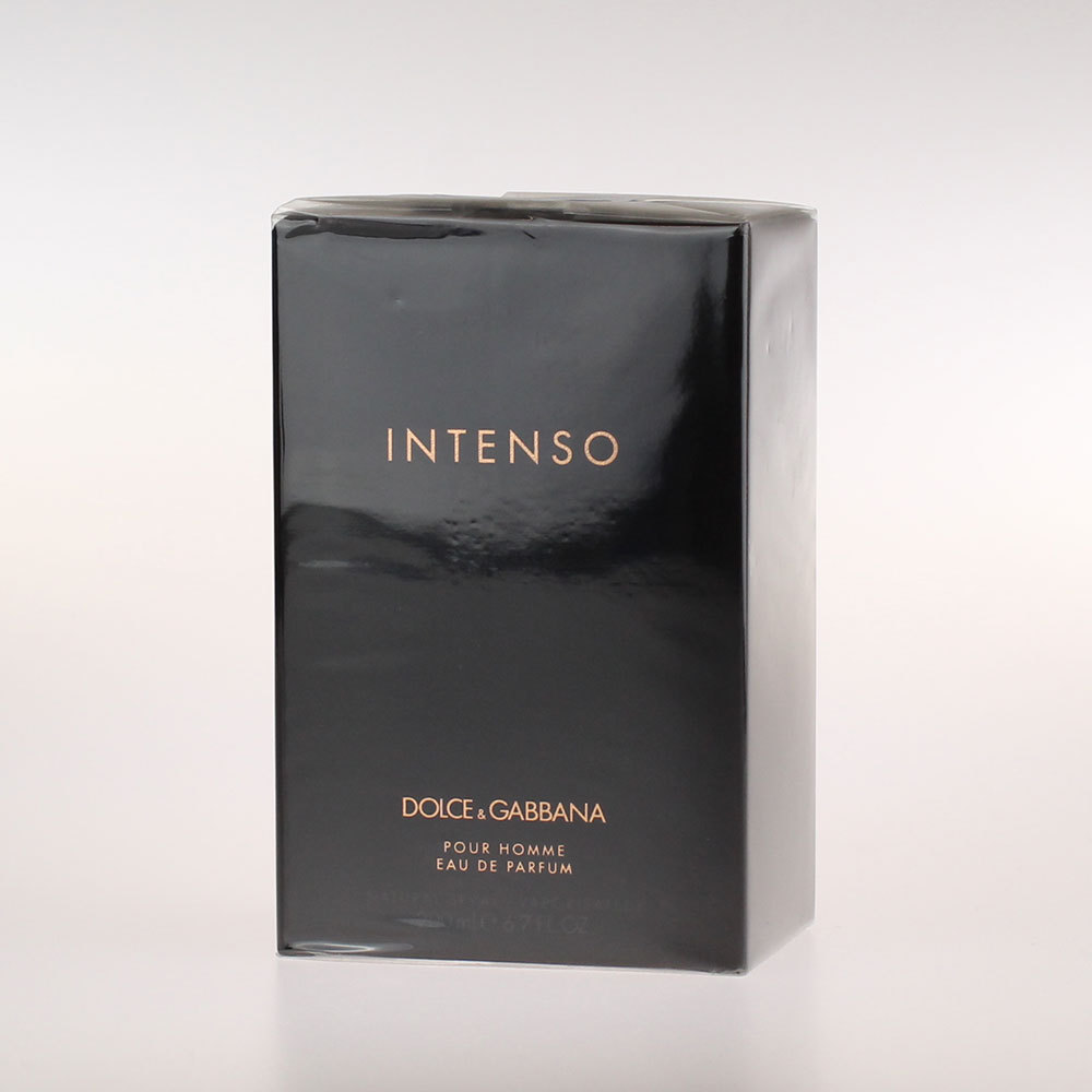 Black rectangular box with a glossy finish, featuring gold text that reads "INTENSO" and "DOLCE & GABBANA POUR HOMME EAU DE PARFUM," 40 ml volume indicated at the bottom.