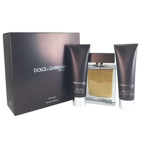 Three-piece travel set featuring a square glass bottle of "The One for Men" fragrance, two dark tube containers, and a sleek black box with silver text.