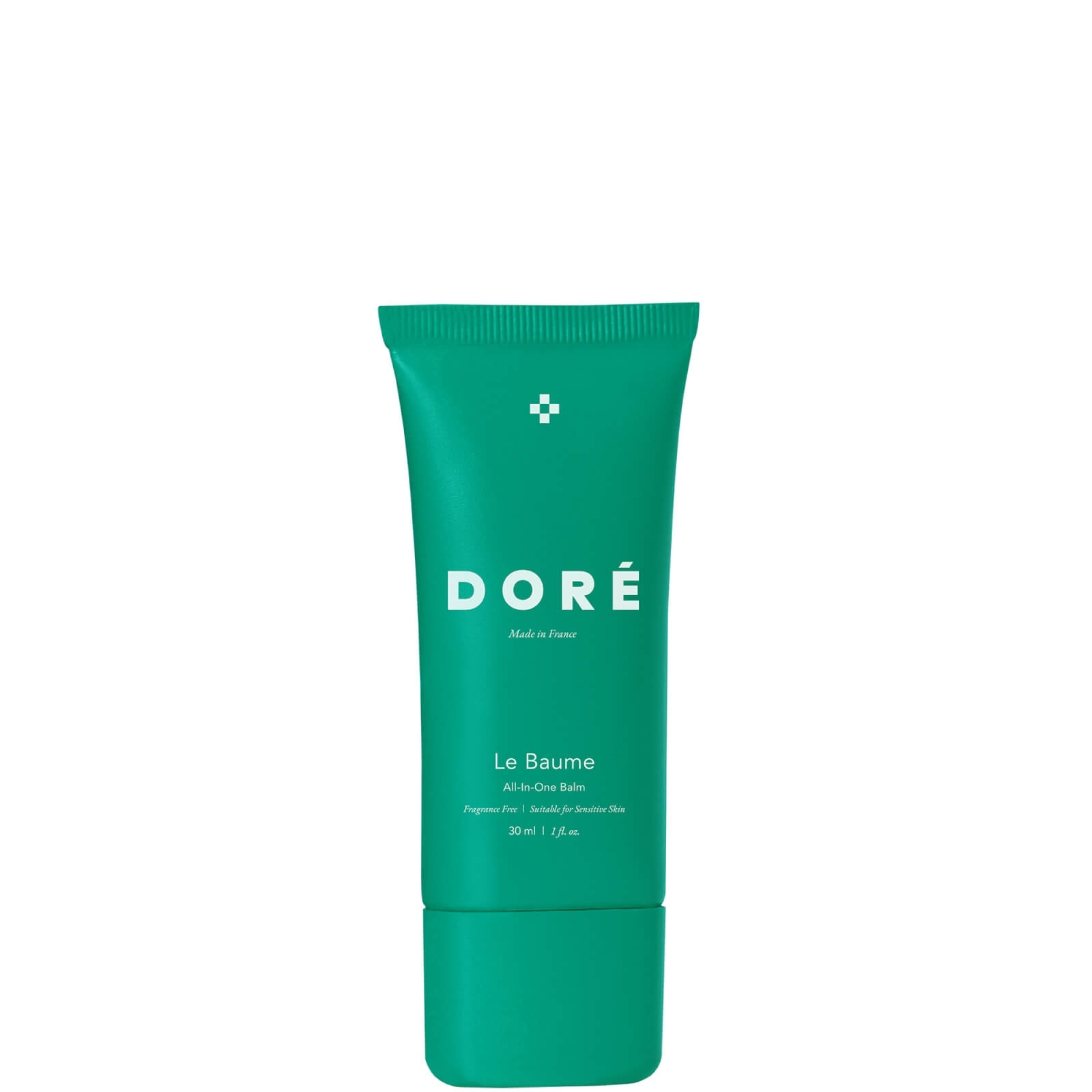Green tube of "Doré Le Baume" 30ml with a white logo and cross symbol, featuring a sleek design and a flip-top cap, ideal for skincare use.