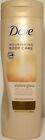 Dove Nourishing Care lotion for fair-medium skin in a gold bottle, featuring a curved design and a label with the Dove logo and product details.