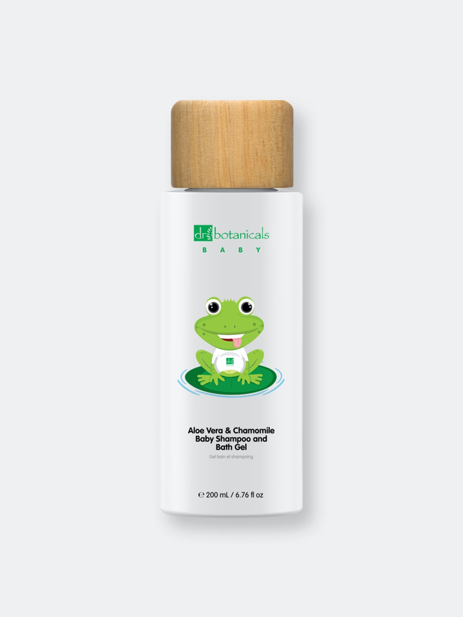 White bottle with a wooden cap, featuring a cartoon frog on a lily pad, labeled "Aloe Vera & Chamomile Baby Shampoo and Bath Gel" in green and black text, 200ml size.