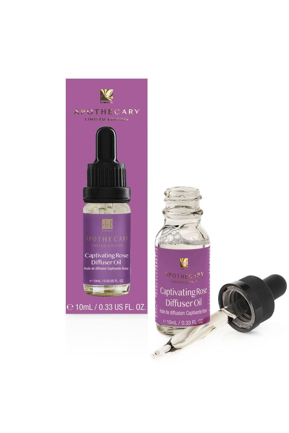 Clear glass bottle with a black dropper cap, containing 10ml of pink rose diffuser oil, displayed alongside a purple and white box labeled "Captivating Rose Diffuser Oil."