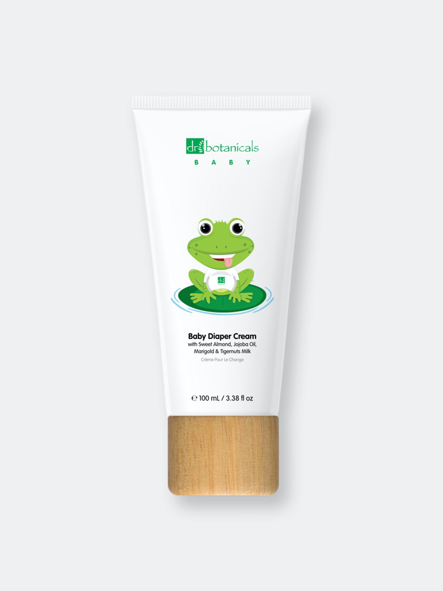 White tube with a playful frog design, wooden cap, and green accents, labeled "Baby Diaper Cream" with jojoba and sweet almond oil, 100ML size.