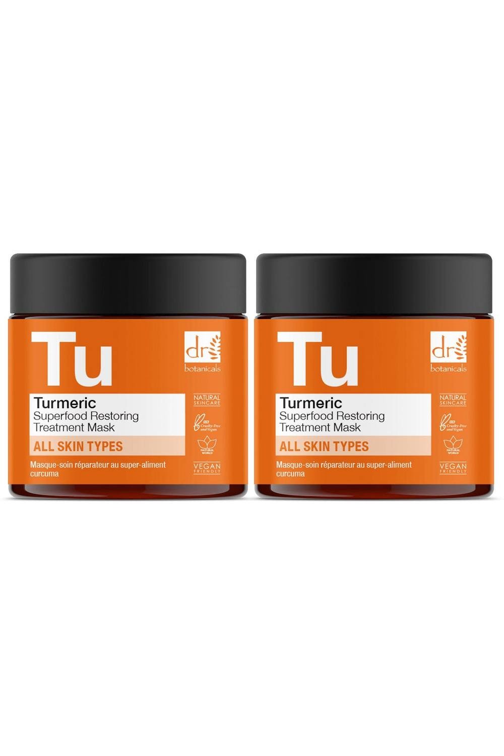 Two jars of Dr. Botanicals Turmeric Superfood Restoring Treatment Mask, each 60ml, featuring a white label with orange accents, suitable for all skin types.