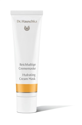 White tube with a gold and white label, featuring "Dr. Hauschka" logo and product name "Hydrating Cream Mask," 30 ml size, designed for moisturizing skin.