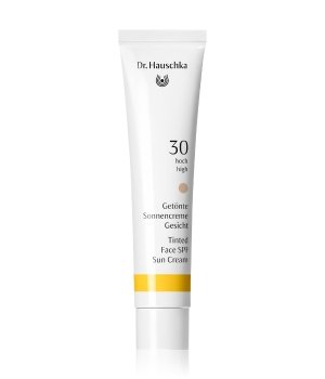White tube with a yellow and beige label, featuring "Dr. Hauschka" branding and "Tinted Sunscreen for the Face SPF 30" text, 40 ml size, designed for facial sun protection.