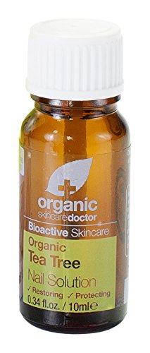 Brown glass bottle with a white screw cap, labeled "Organic Tea Tree Nail Solution," highlighting its restorative and protective properties, 10ml size.