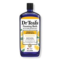 Dr Teal's 34oz foaming bath bottle features a deep blue plastic container with a label showcasing lemon balm, sage, and thyme, accented by lemon graphics.