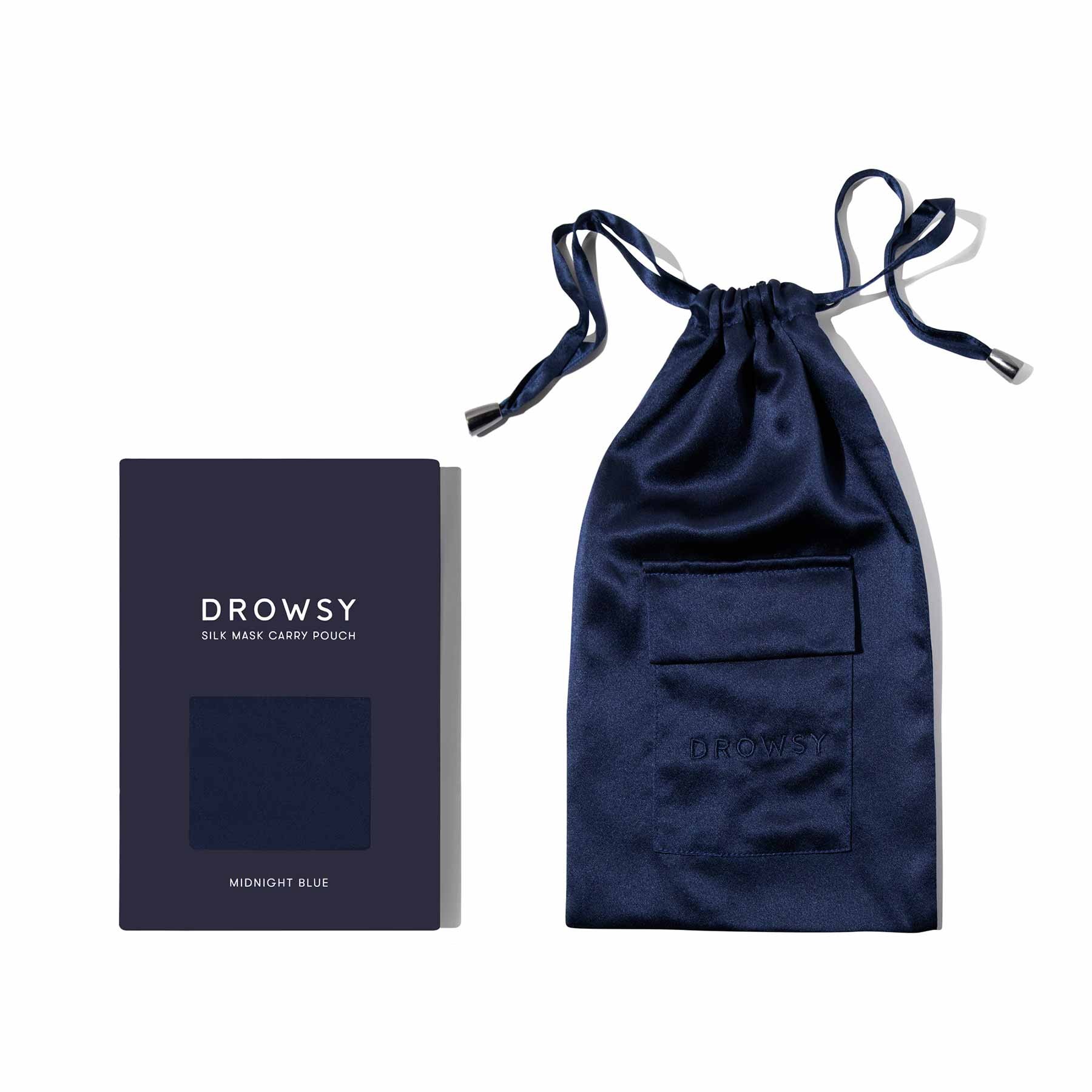 Midnight blue silk carry pouch by Drowsy, featuring a drawstring closure and a small front pocket, packaged with a matching card displaying the product name.