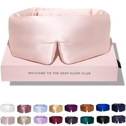 Soft, satin sleep mask in sunset pink, featuring a contoured design for comfort, displayed on a pastel pink box with "WELCOME TO THE DEEP SLEEP CLUB" text and various color options below.