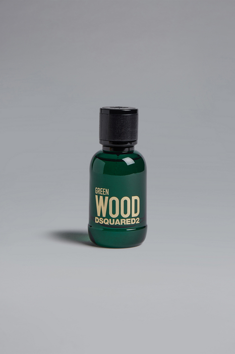 Green Wood Eau De Toilette by Dsquared2 in a clear glass bottle with a dark green tint, featuring bold gold lettering on the front and a black cap.