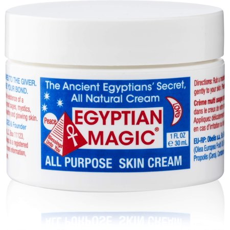 White jar with a blue and red label featuring "EGYPTIAN MAGIC" in bold letters, detailing it as an all-purpose skin cream with natural ingredients.