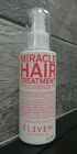 White spray bottle with a clear pump, featuring bold pink text that reads "MIRACLE HAIR TREATMENT," labeled for unisex use, 4.2 oz size.