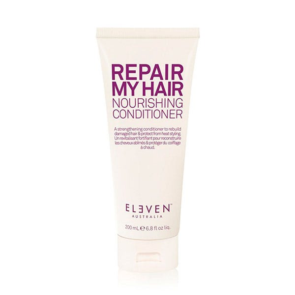 White tube with a flip-top cap, featuring bold purple text that reads "REPAIR MY HAIR Nourishing Conditioner," 200ml size, from Eleven Australia.