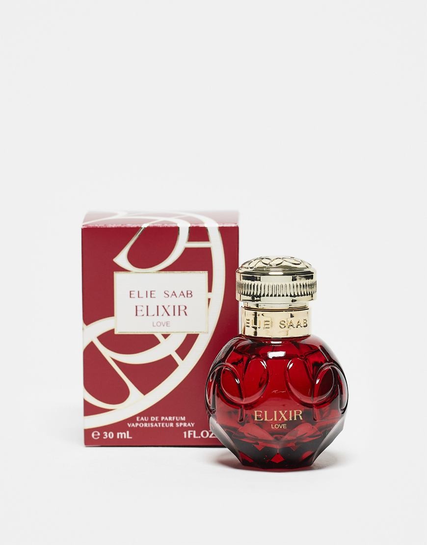 Red glass perfume bottle with a round shape and ornate gold cap, accompanied by a matching red and gold box labeled "Elie Saab Elixir Love EDP - 30 Ml."