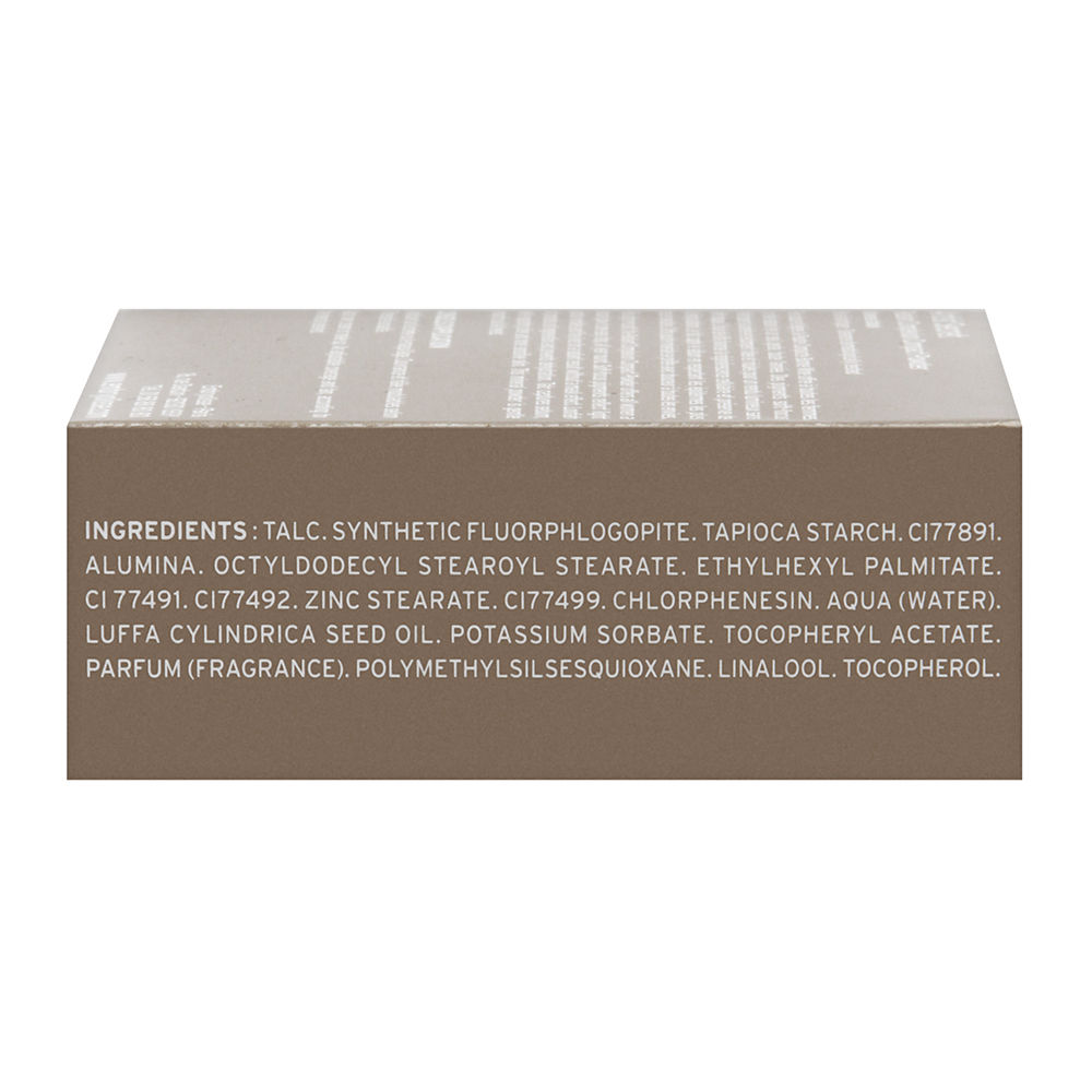 Compact powder bronzing illuminator in a sleek, matte brown box featuring white text listing ingredients, with a minimalist design and a clean, modern aesthetic.