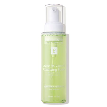 Clear bottle of Eminence Acne Advanced Cleansing Foam, 5 oz, featuring a pump dispenser, with a light green liquid inside and a white label displaying the brand and product name.