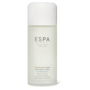 Clear glass bottle with a white cap, labeled "ESPA" and "Hydrating Floral Spa Fresh Tonic 200ml," featuring a minimalist design and light floral graphics.